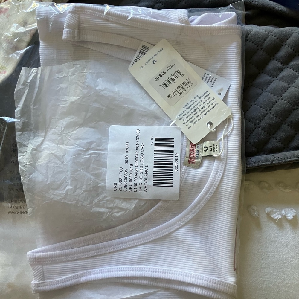Size large true religion tank top. Awesome material and brand new with tags.